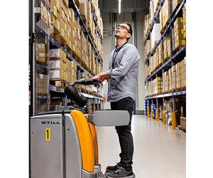 An Associate working in a warehouse.